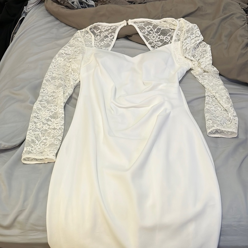 white dress, goes right under knees, lace arms, zipper back